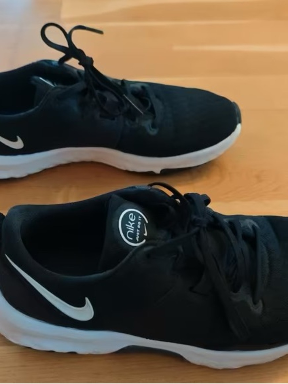 Nike Men’s Black Athletic Sneakers with White Swoosh